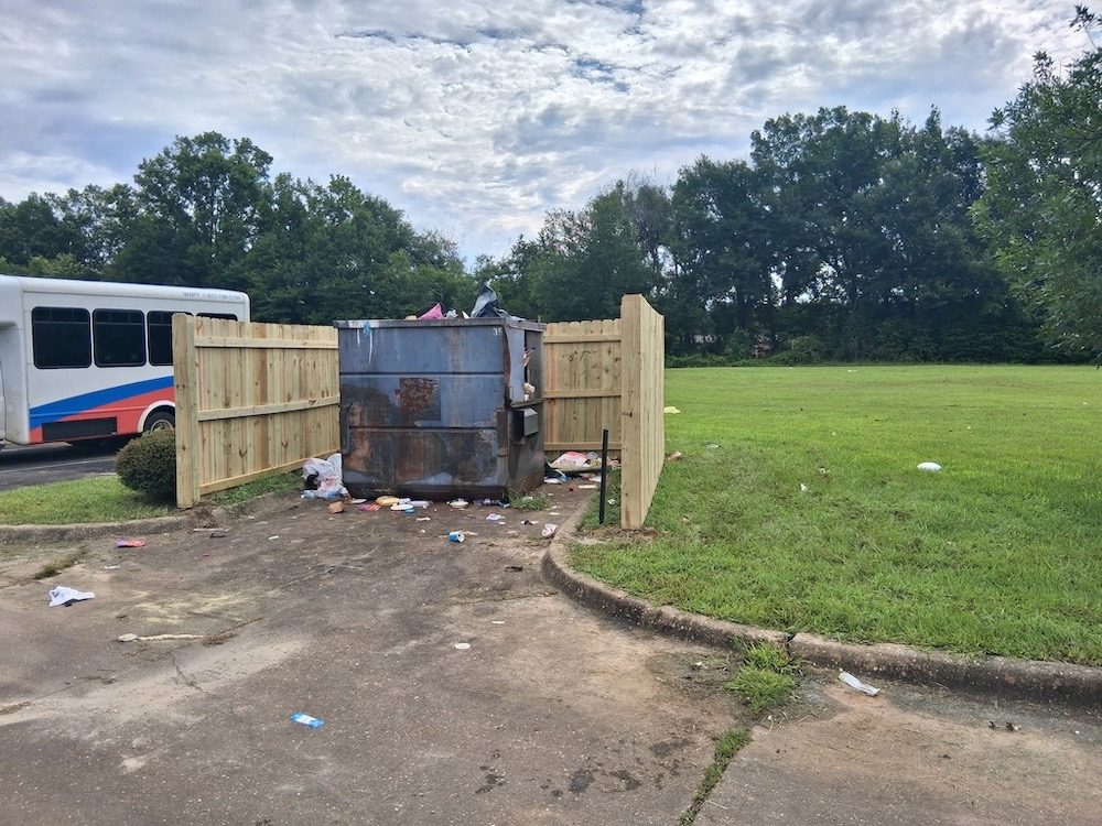 Commercial wood dumpster enclosure fencing in Birmingham, AL